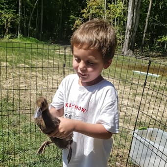 Youngest Holding Duck